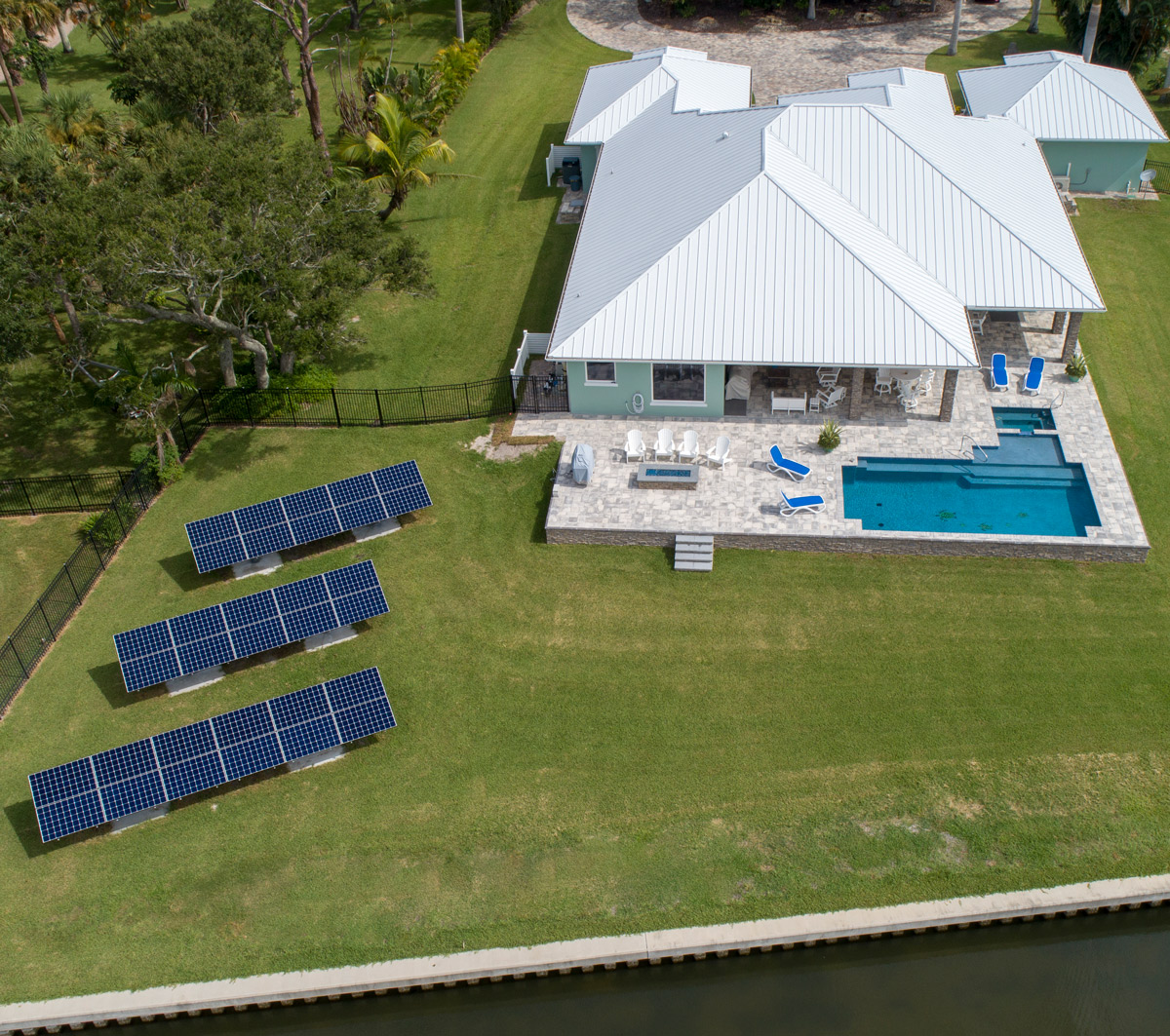 home with swimming pool on the coast with three solar arrays