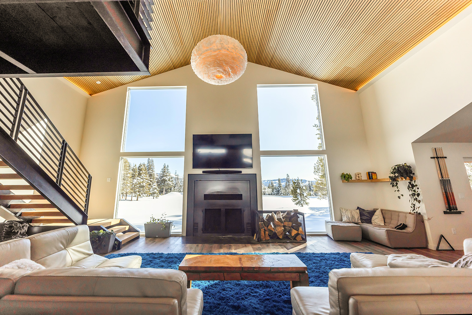 home interior with windows looking out at jackson meadows sierra nevadas